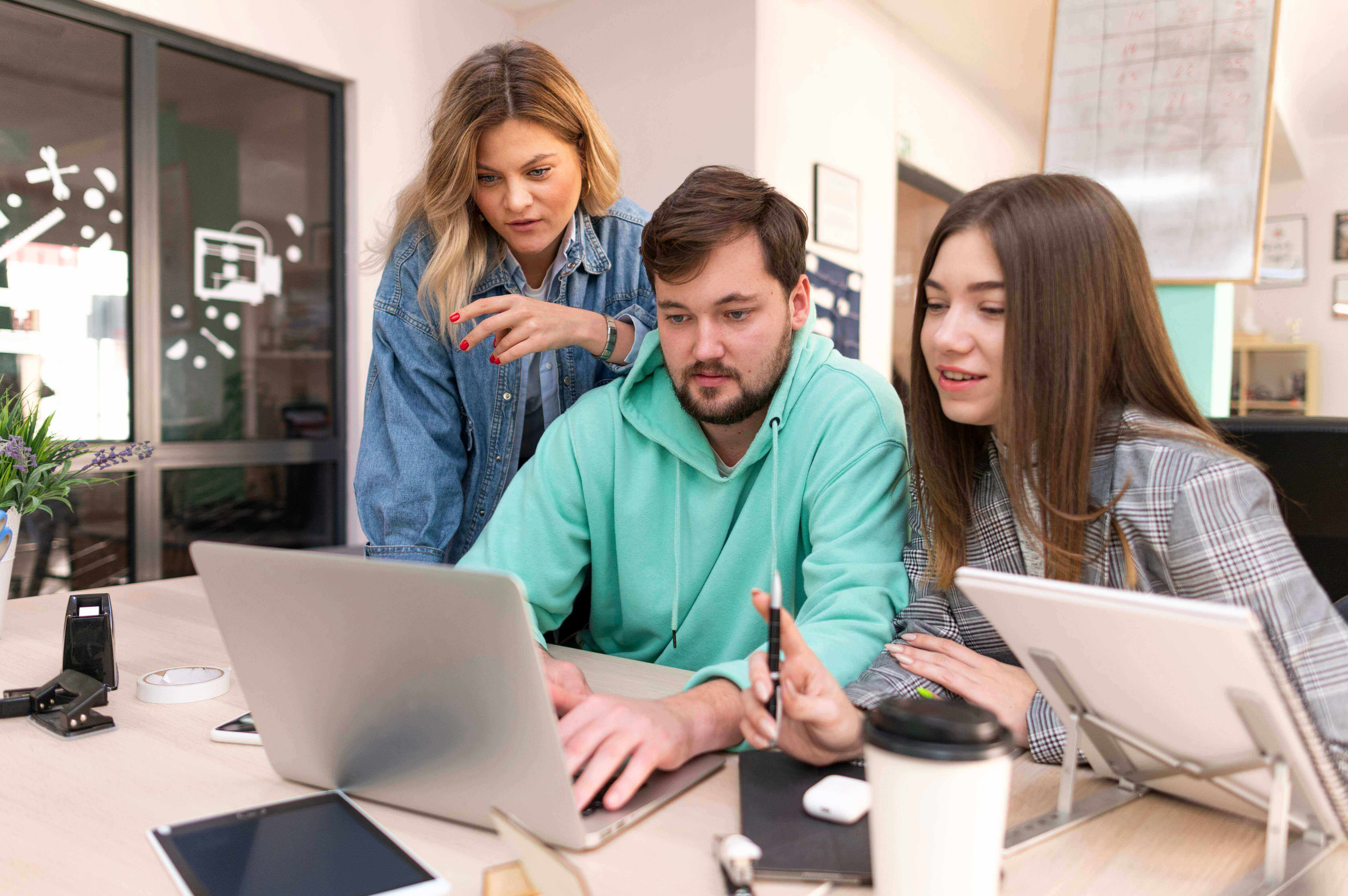 Clouds Court team of IT professionals collaborating in office